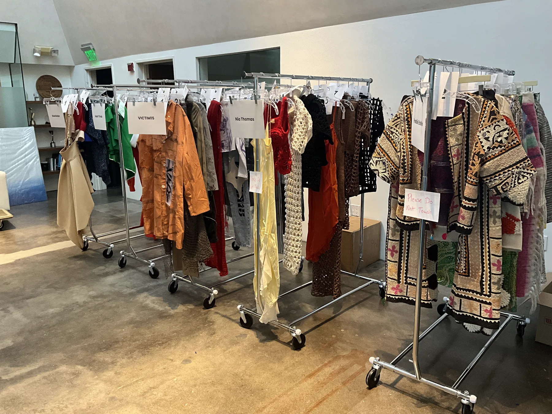 Wardrobe rack of the designers' collections ready for the runway