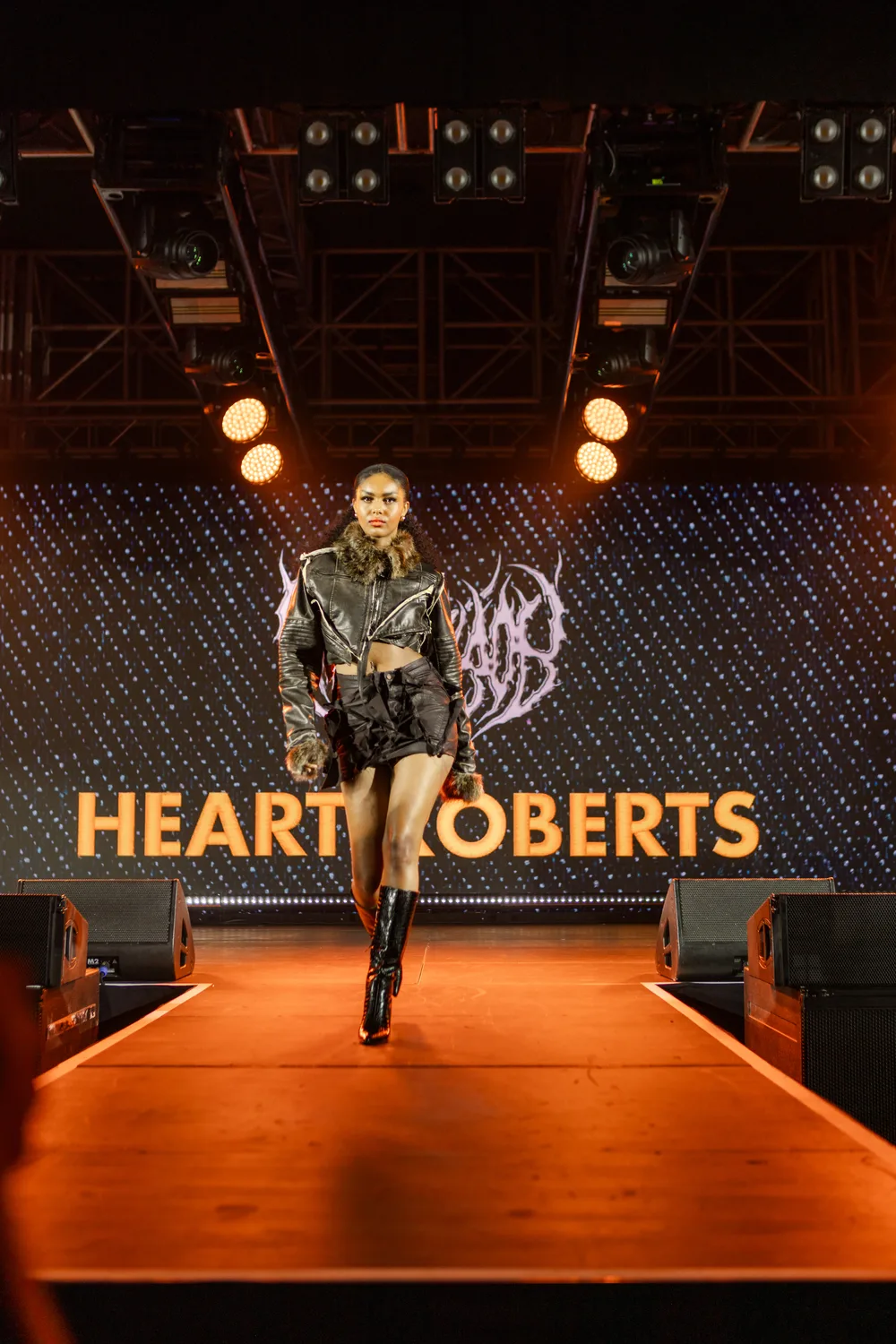 A model on the runway in a HEARTHROB look
