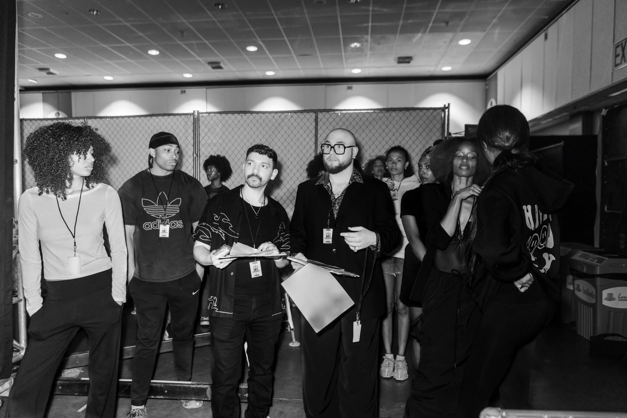 Production team reviewing the run of show backstage