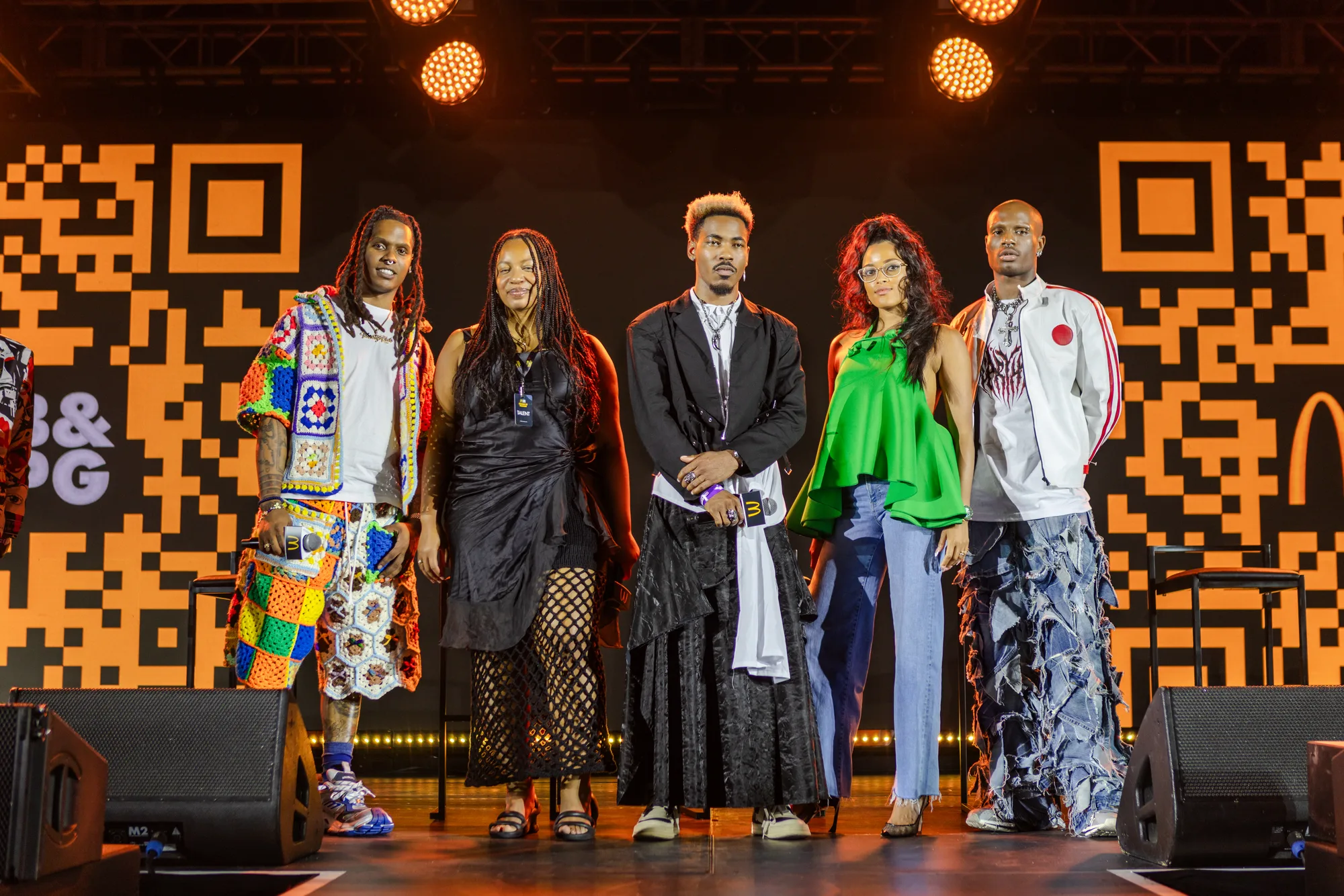 The Change of Fashion designers on stage at the activation